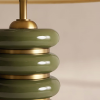 Greyson Table Lamp by Soho Home. High-gloss olive lacquered base. Antique brass details. Linen shade. Inspired by Soho House.