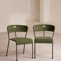 Lisson dining chairs by Soho Home crafted using a bespoke hand-dyed woven rope suspension. Olive green colour and stackable design.