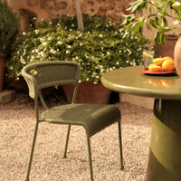 Lisson dining chairs by Soho Home crafted using a bespoke hand-dyed woven rope suspension. Olive green colour and stackable design.