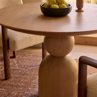 Lowden Round Oak Dining Table by Soho Home. Simple yet sculptural form creates a modern crafted look. Inspired by Soho House.