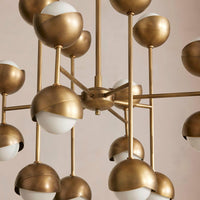 Seed Chandelier by Soho Home. Cluster of bisected orbs in hand-applied patinated brass. Inspired by Soho House.