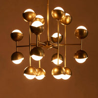 Seed Chandelier by Soho Home. Cluster of bisected orbs in hand-applied patinated brass. Inspired by Soho House.