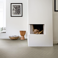 The Tile People Marazzi Bricco Porcelain Wall and Floor Tile. Herringbone layout.