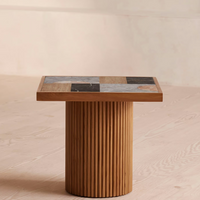 Cavern Side Table by Soho Home. A mix of travertine and honed Jade Shell, Golden Portoro and Grey Pesco marble with inlay pattern. Solid oak fluted base. Inspired by Soho House.