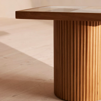 Cavern Side Table by Soho Home. A mix of travertine and honed Jade Shell, Golden Portoro and Grey Pesco marble with inlay pattern. Solid oak fluted base. Inspired by Soho House.