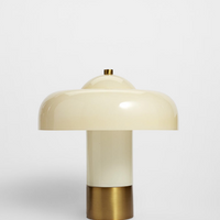Soho Home Giovanni Table Lamp Cream. Crafted white domed glass. Aged brass details. Dimmable light.