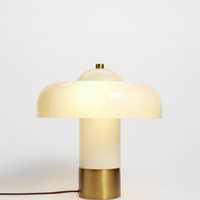 Soho Home Giovanni Table Lamp Cream. Crafted white domed glass. Aged brass details. Dimmable light.