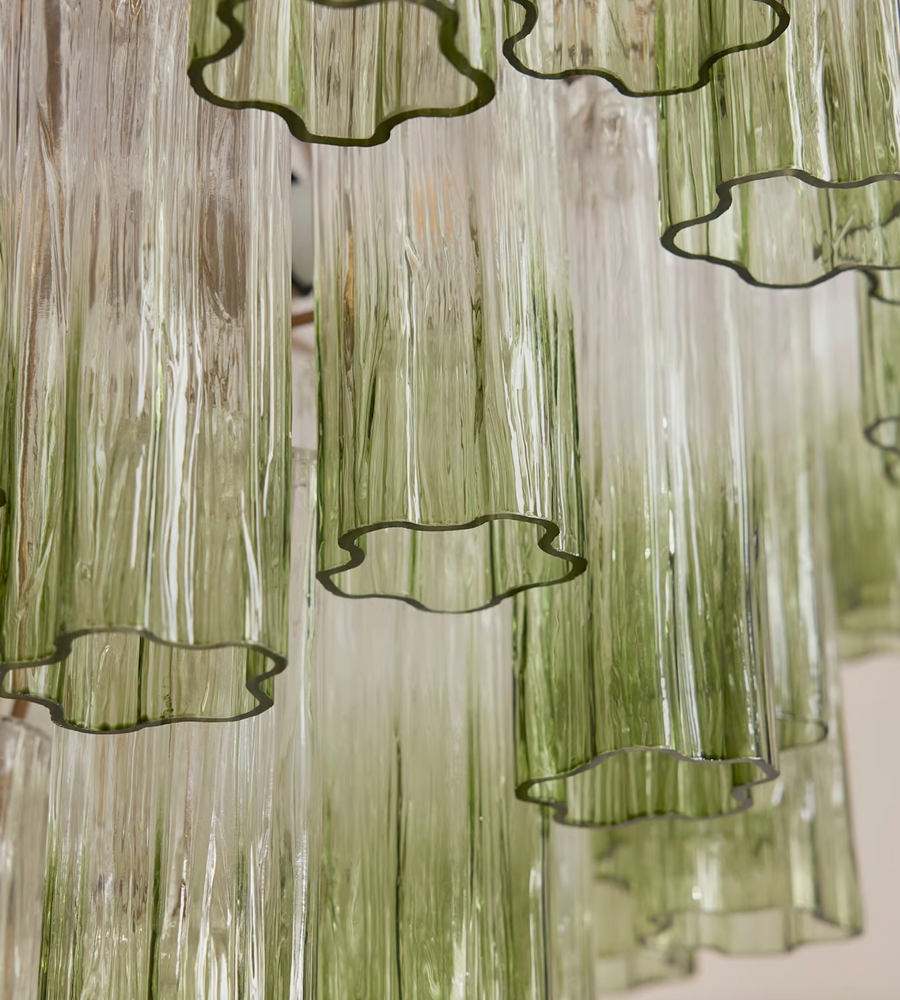 Chiara Chandelier by Soho Home. Multiple green ombre, scalloped glass tubular sections. Hand-finished by skilled artisans. Inspired by Soho Home.