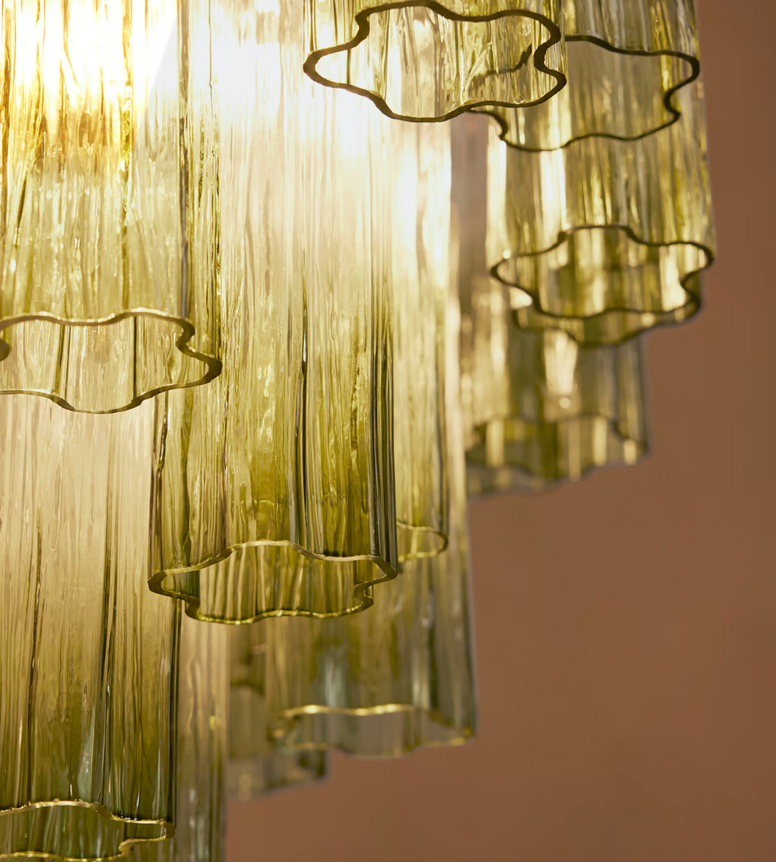 Chiara Chandelier by Soho Home. Multiple green ombre, scalloped glass tubular sections. Hand-finished by skilled artisans. Inspired by Soho Home.