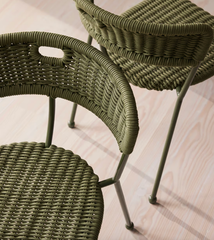 Lisson dining chairs by Soho Home  crafted using a bespoke hand-dyed woven rope suspension. Olive green colour and stackable design.