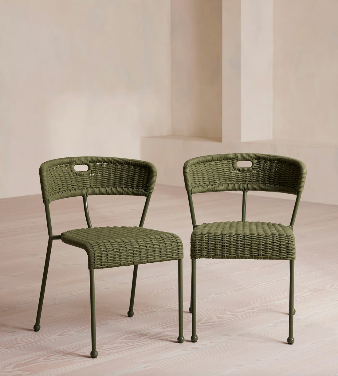 Lisson dining chairs by Soho Home  crafted using a bespoke hand-dyed woven rope suspension. Olive green colour and stackable design.