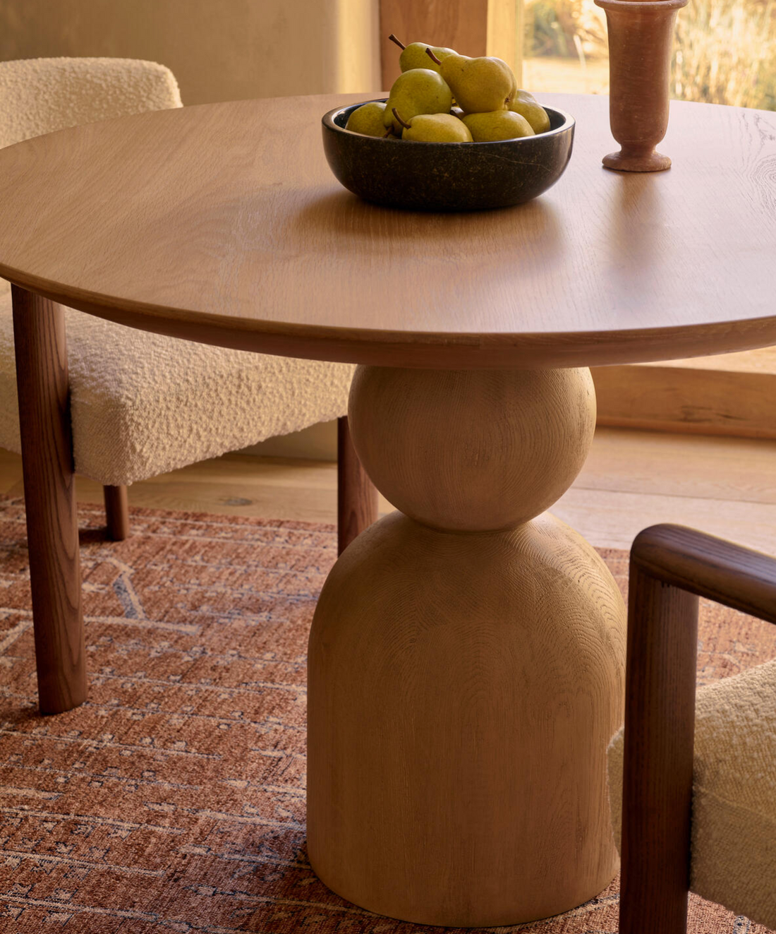 Lowden Round Oak Dining Table by Soho Home. Simple yet sculptural form creates a modern crafted look. Inspired by Soho House.