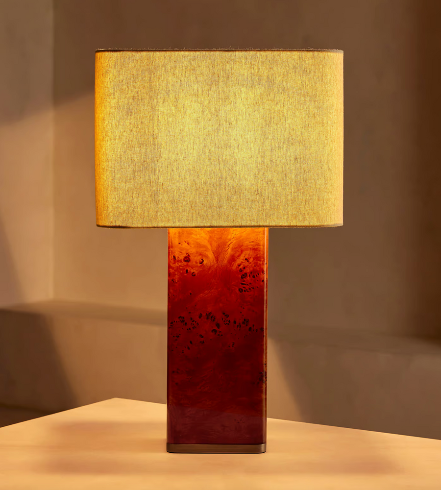 The Remi table lamp by Soho Home.  Designed with a rectangular base in dark oak mappa burl timber. Complemented with a natural linen shade. Inspired by Soho House.